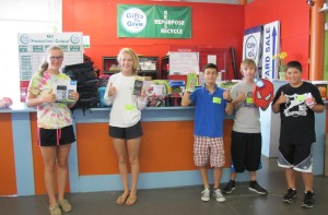 Summer Student Interns unloading EMMT’s donation at the mill